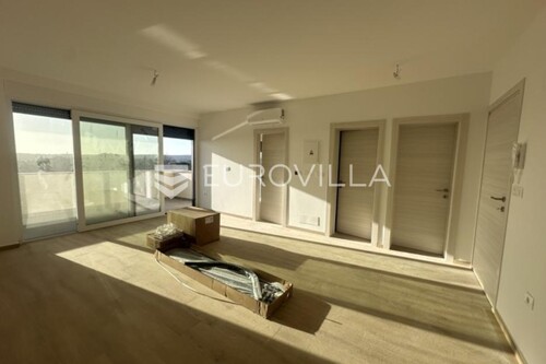 Istra, Medulin, moderan stan s pogledom more NKP 65m2 na drugom katu - novogr...