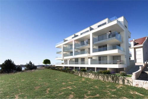 OTOK PAG, POVLJANA - 2-SOBNI APARTMAN U PRIZEMLJU, 1.RED OD
